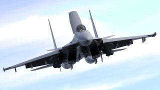 Military jet flying blue sky - epsylon point free wallpaper