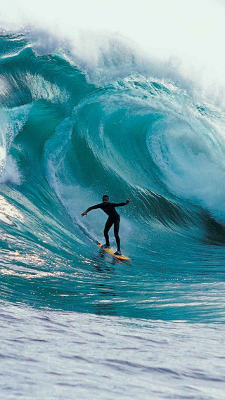 Man riding wave surfboard ocean 21 - a man riding free wallpaper