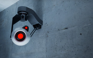 Security camera red lights building - the side of a building free wallpaper