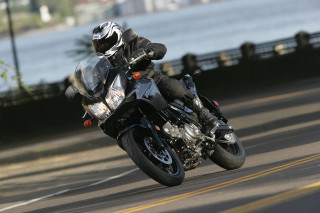 Man motorcycle helmet bridge lake - allen tupper true free wallpaper