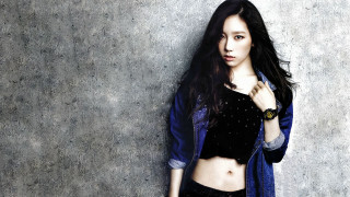 Woman long hair jacket jeans - her wrist free wallpaper