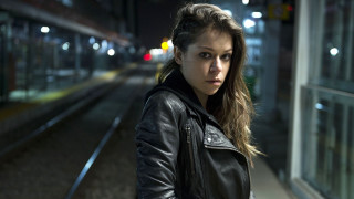 Woman standing train station night - catrin g grosse free wallpaper