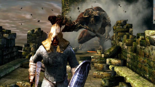 Man armor fighting giant sword - a sword and shield free wallpaper