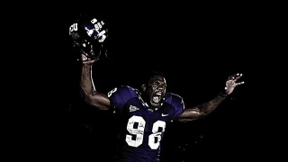 Football player hands up smiling - a football player free wallpaper