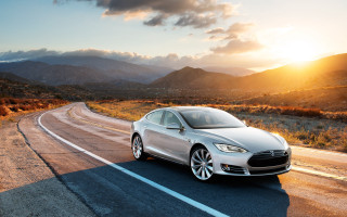 White car driving mountains sunset - digital free wallpaper for desktop