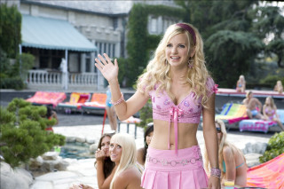 Woman pink outfit waving crowd - other person free wallpaper
