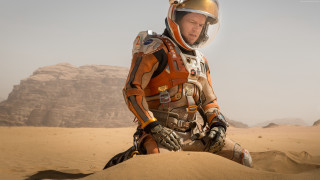 Man space suit desert dune - a man in a space suit free wallpaper