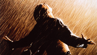 Man standing rain arms outstretched 2 - his arm free wallpaper