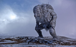 Giant standing snowy hill sky - ed binkley free wallpaper