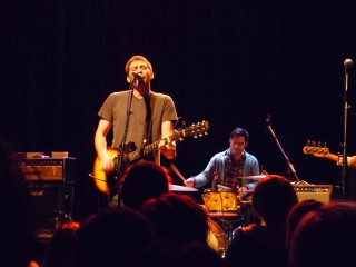 Guitarists performing in dark room - ben zoeller free wallpaper