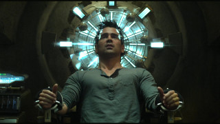 Man standing circular object room - biopunk free wallpaper