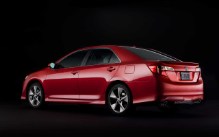 Red car dark room black 4 - side profile free wallpaper