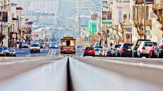Trolley city street buildings traffic 2 - car free wallpaper