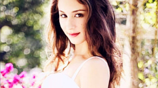Fantastically beautiful woman flower background - the background and a tree in the foreground free wallpaper