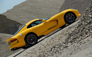 Yellow sports car desert hill - a yellow sports car free wallpaper