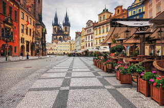 Cobblestone street clock tower buildings - free architecture wallpaper