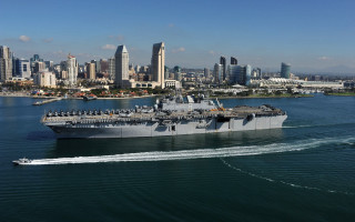 Large ship city skyline ocean - tall free wallpaper