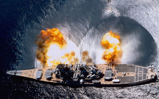 Large ship fire water boat - a boat in the background free wallpaper