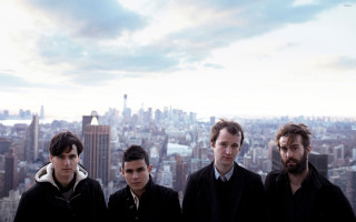 Men city skyline skyscrapers group 2 - a group of men free wallpaper