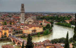 Correggio city river bridge skyscraper - a city next free wallpaper