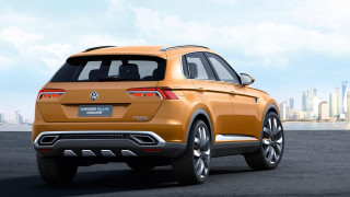 Yellow volkswagen suv parking lot - a blue sky in the foreground free wallpaper