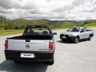 Cars parked parking lot mountains - the sky above them free wallpaper