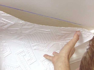 Person painting white wall wallpaper - a silk screen free wallpaper
