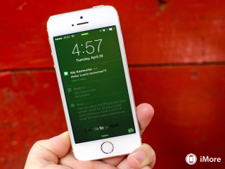 Person holding cell phone time - text free wallpaper