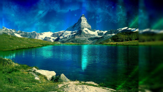 Mountain lake clouds green field - a green field below free wallpaper