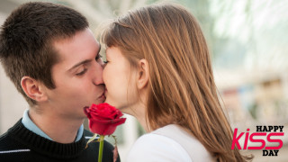 Man kissing woman red rose - romantic free wallpaper