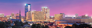 City skyline pink purple sky - building and trees free wallpaper