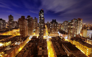City night tall buildings lit - ashcan school free wallpaper
