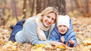 Woman child leaves forest trees - a woman and a child free wallpaper