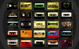 Cassette tapes grid black background - a white circle free wallpaper