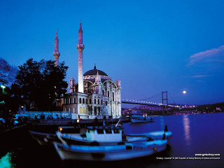 Boat docked building tower night - a tower free wallpaper