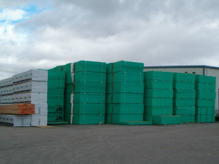 Green barrels stack building cloudy - a cloudy day free wallpaper