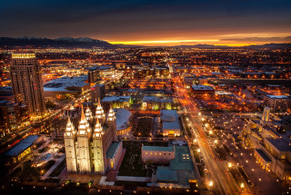 City night clocktower lights buildings - radiant free wallpaper