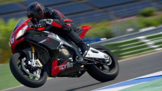 Person riding motorcycle track helmet 2 - a helmet free wallpaper