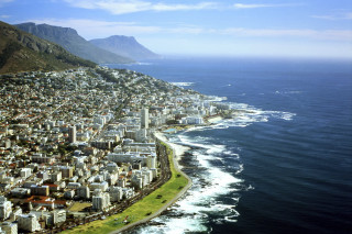 City ocean mountain water foreground - a mountain in the background and a body of water free wallpaper
