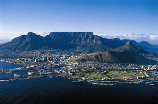 City mountain water foreground background - aerial free wallpaper