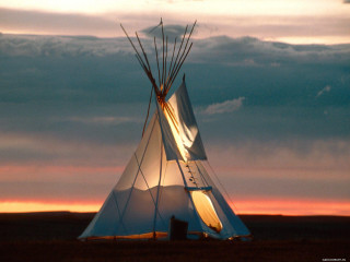 Teepee sunset field clouds sky 2 - a sunset in the background free wallpaper