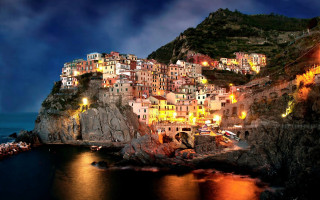 City cliff ocean night lights 4 - a cliff above the ocean free wallpaper