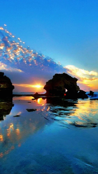 Sunset water rocks sky clouds 2 - andrew law free wallpaper