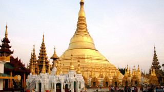 Golden white building spires people - it in front free wallpaper