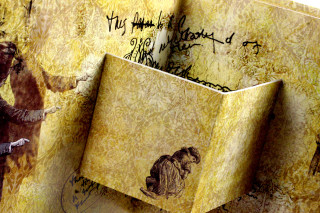 Folded book woman child desert - brian and wendy froud free wallpaper
