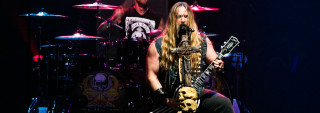 Man long hair guitar stage - long hair playing free wallpaper