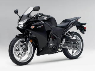 Black motorcycle parked white gray - a black motorcycle free wallpaper
