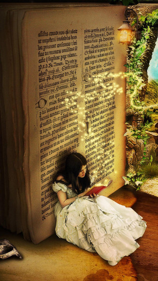 Girl sitting book light reading - a light free wallpaper