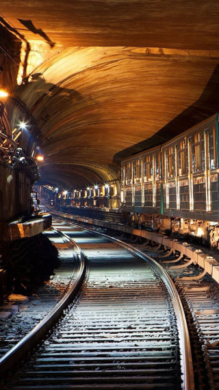 Train coming tunnel night time - viennese actionism free wallpaper