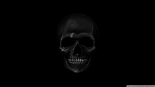 Skull dark background white left - a white skull free wallpaper